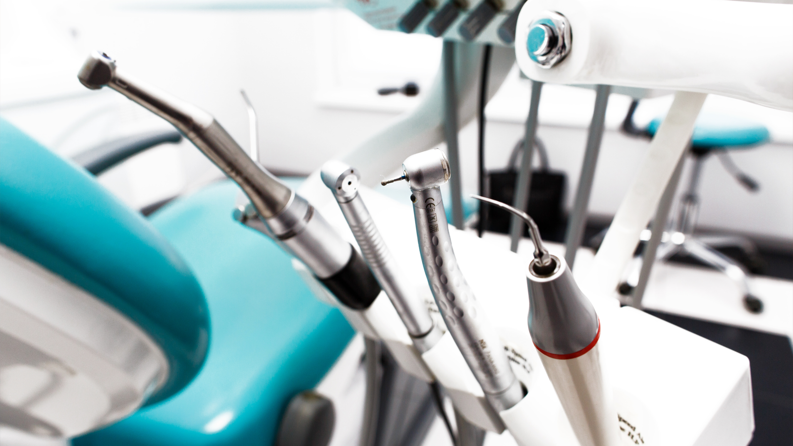 Dental equipment showroom with modern chairs and instruments